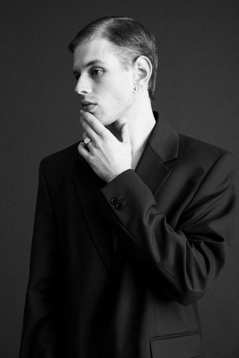 Professional wearing a well-fitted business suit for a headshot