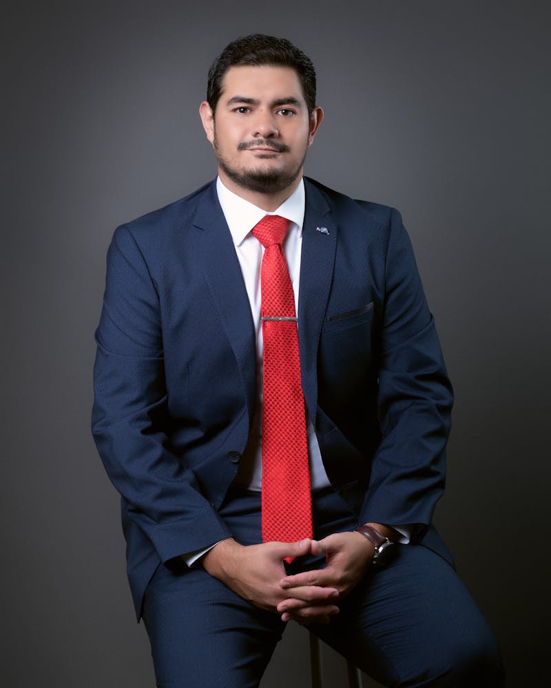 Corporate headshot example of a professional in a business suit