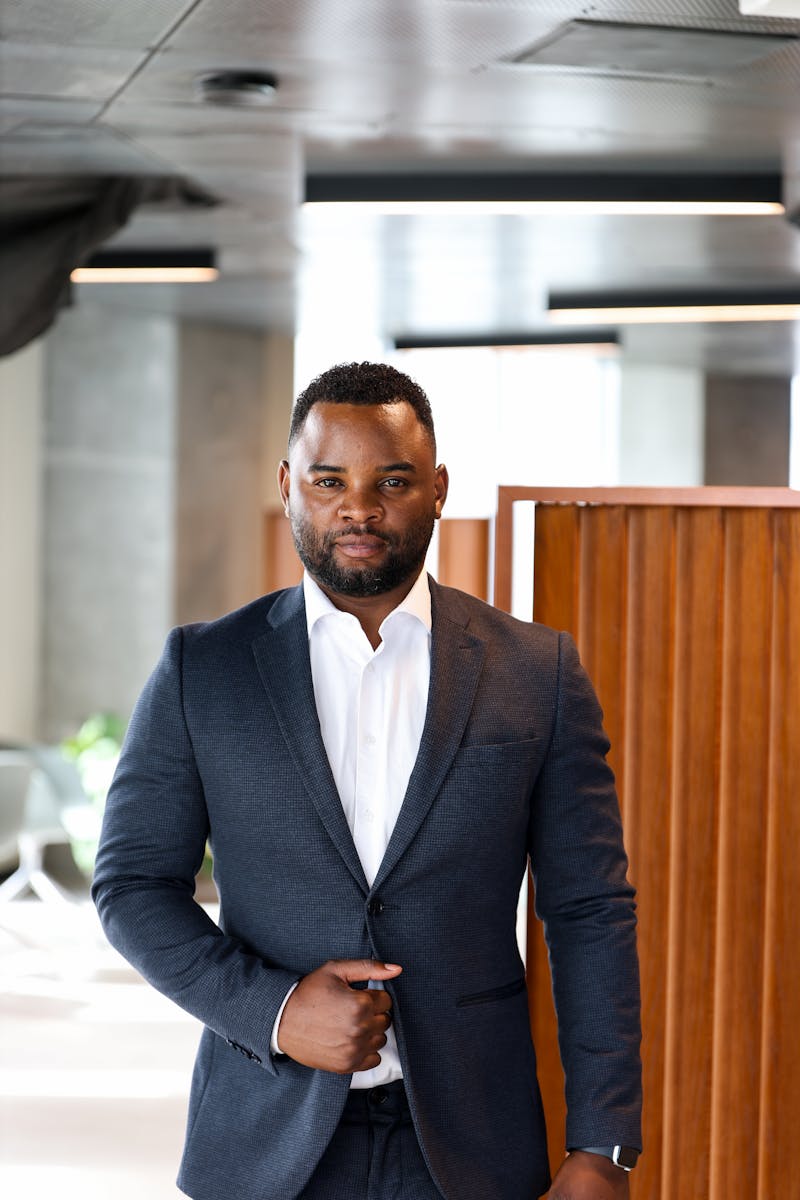 Environmental headshot of a professional in a modern office setting
