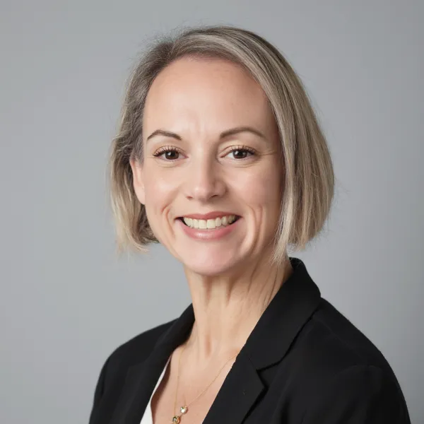 Professional AI headshot of a woman in business attire generated by AiProPortrait